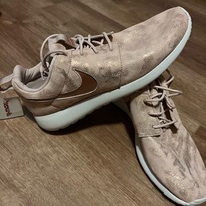 Nike pink shiny shoes! Never worn!